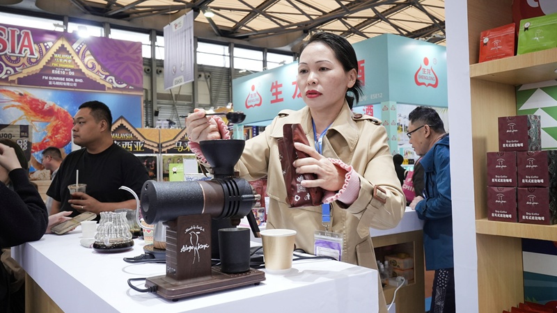 业亮相第二十八届FHC上海环球食品展麻将胡了模拟器试玩海南13家咖啡企(图3)